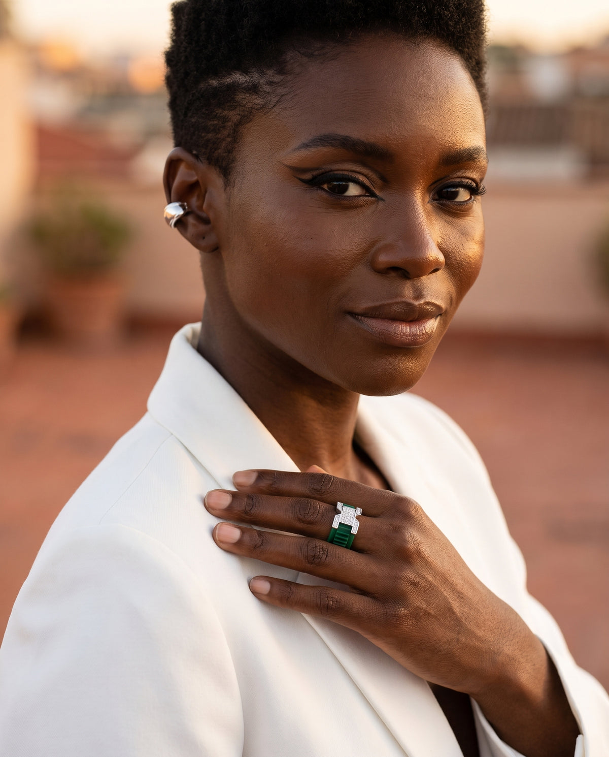 AELIA Flex Ring in Aventine Green, worn by a woman, evening look