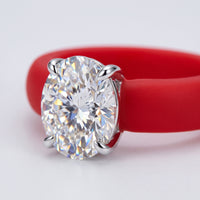 SABINA Flex Ring in Pompeii Red, close-up of the oval moissanite